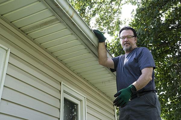 Gutter Cleaning of West Orange workers